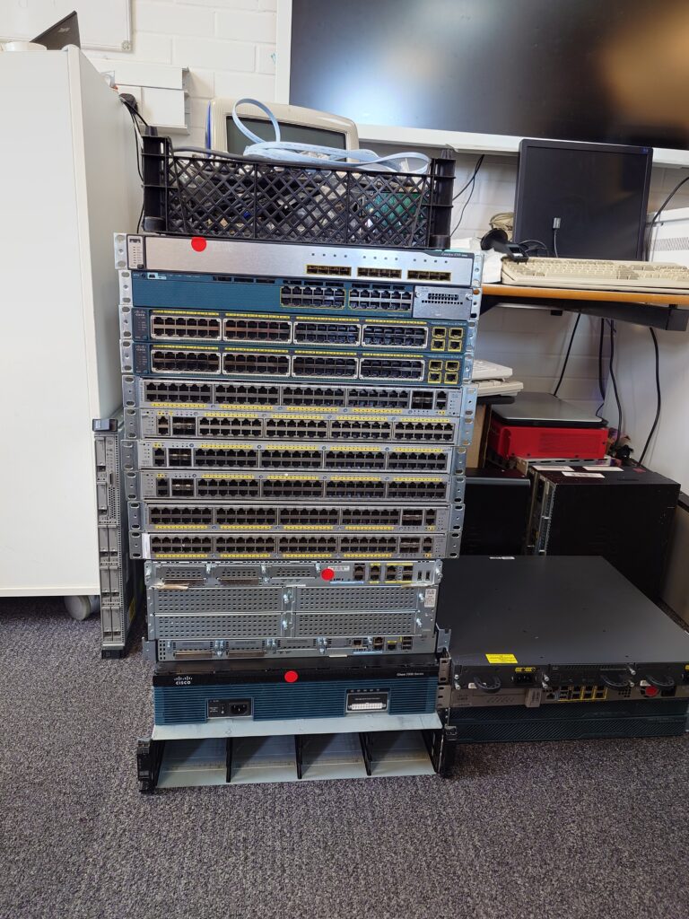 Stack of Cisco enterprise rack equipment. 